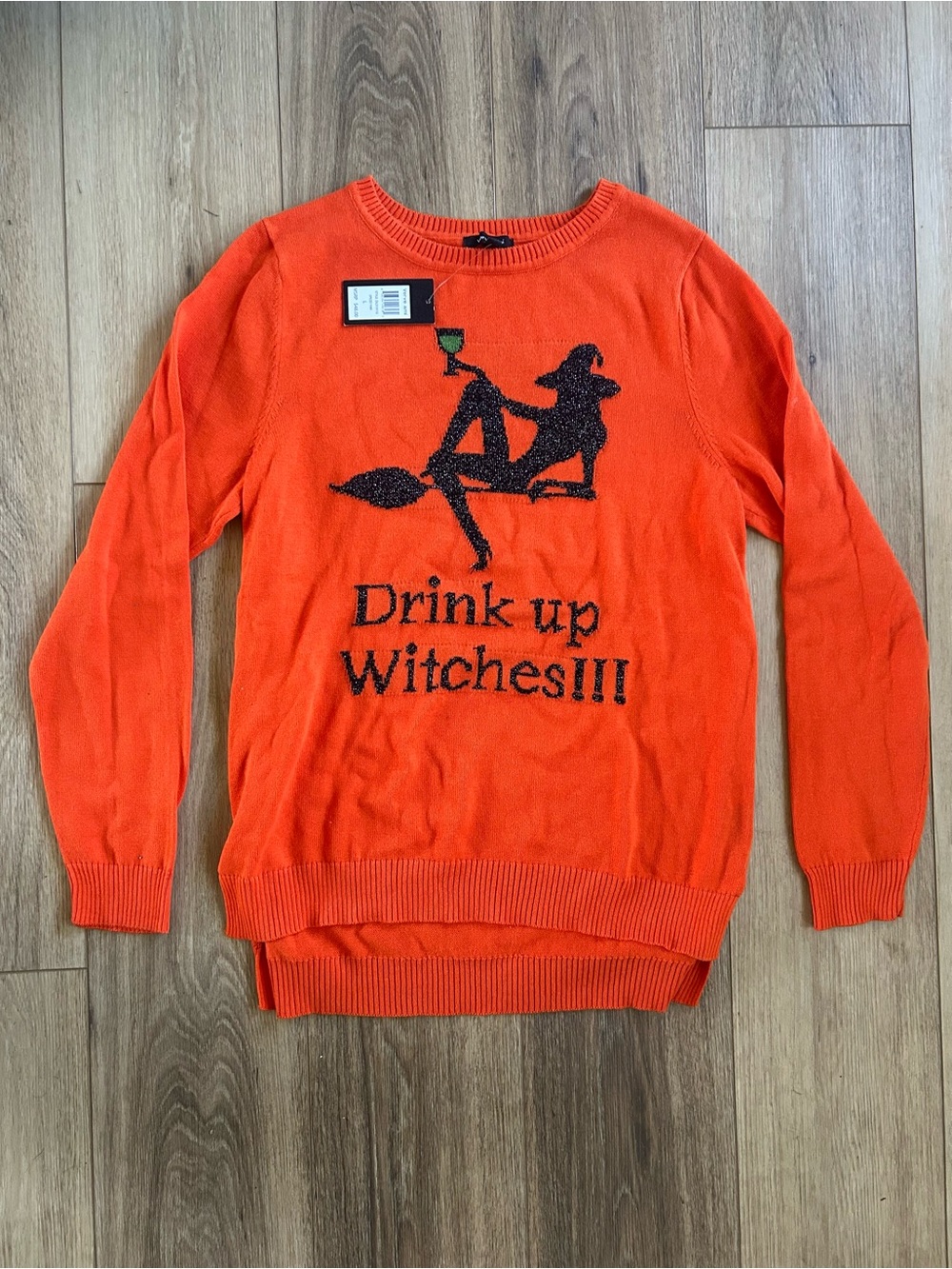 Verve Ami Orange Crewneck Sweater with Witch Graphic